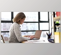 Download Serious Focused Business Woman Working on Laptop (Videohive 43647847)